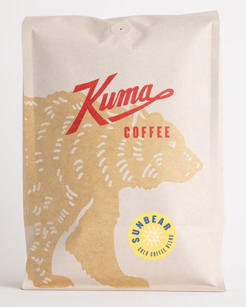 Kuma Coffee Craft coffee bulk bag compostable coffee, Sun Bear Iced Coffee blend , with a coffee bear wrapping around the front